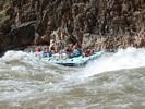 Commercial raft running the left side of Crystal Rapid in the Grand Canyon